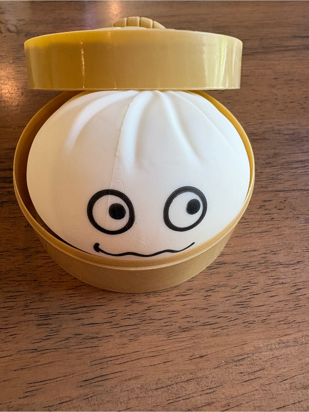 Squishy Bun Stress Ball in Yellow Case - White Face